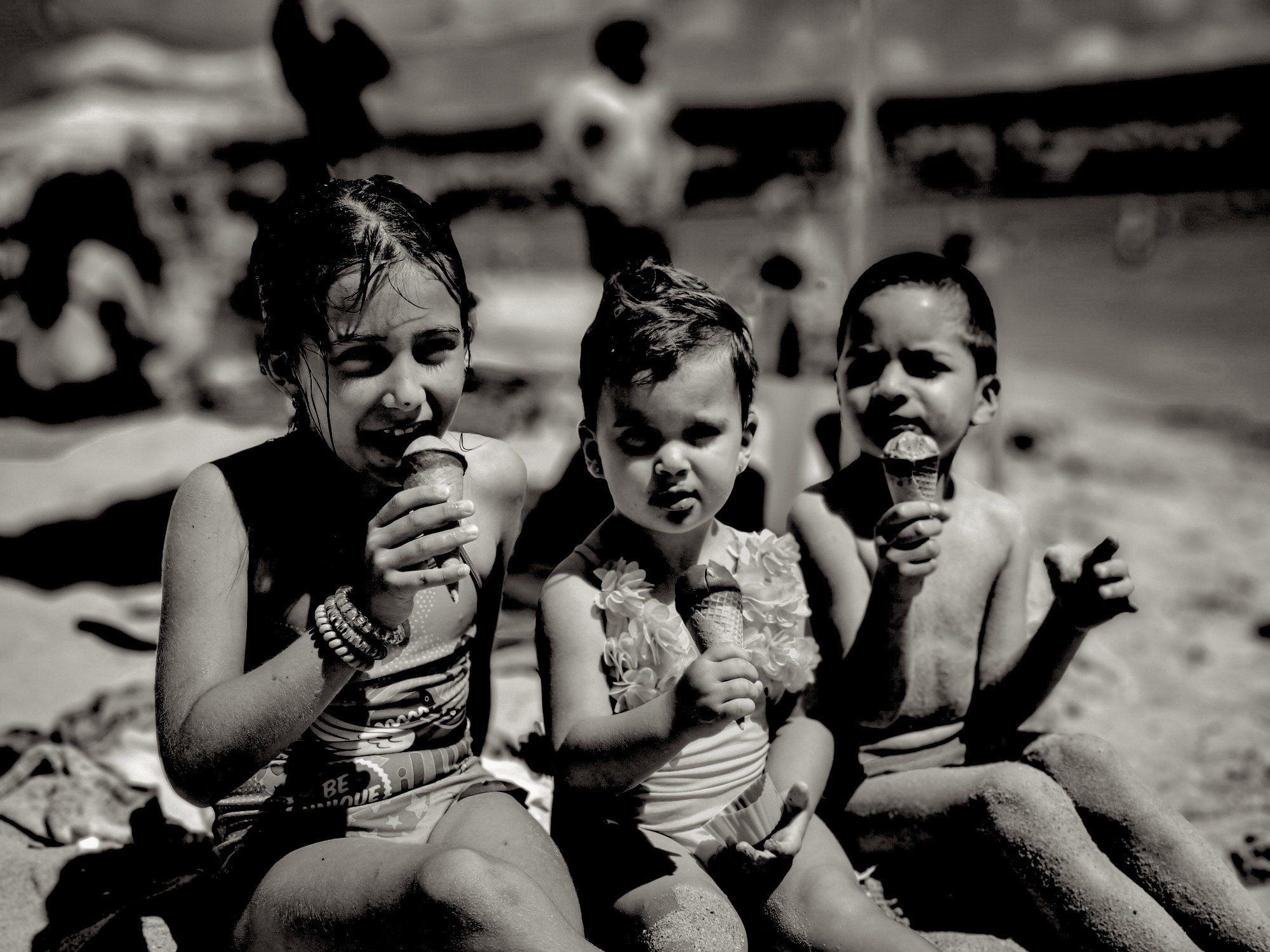 Black and white photo of kids eating ice cream