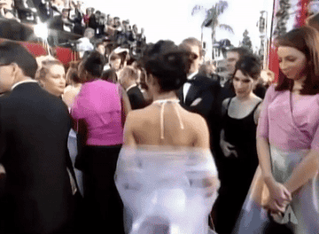 Salma Hayek poses and smiles on the Oscars red carpet  in 2000