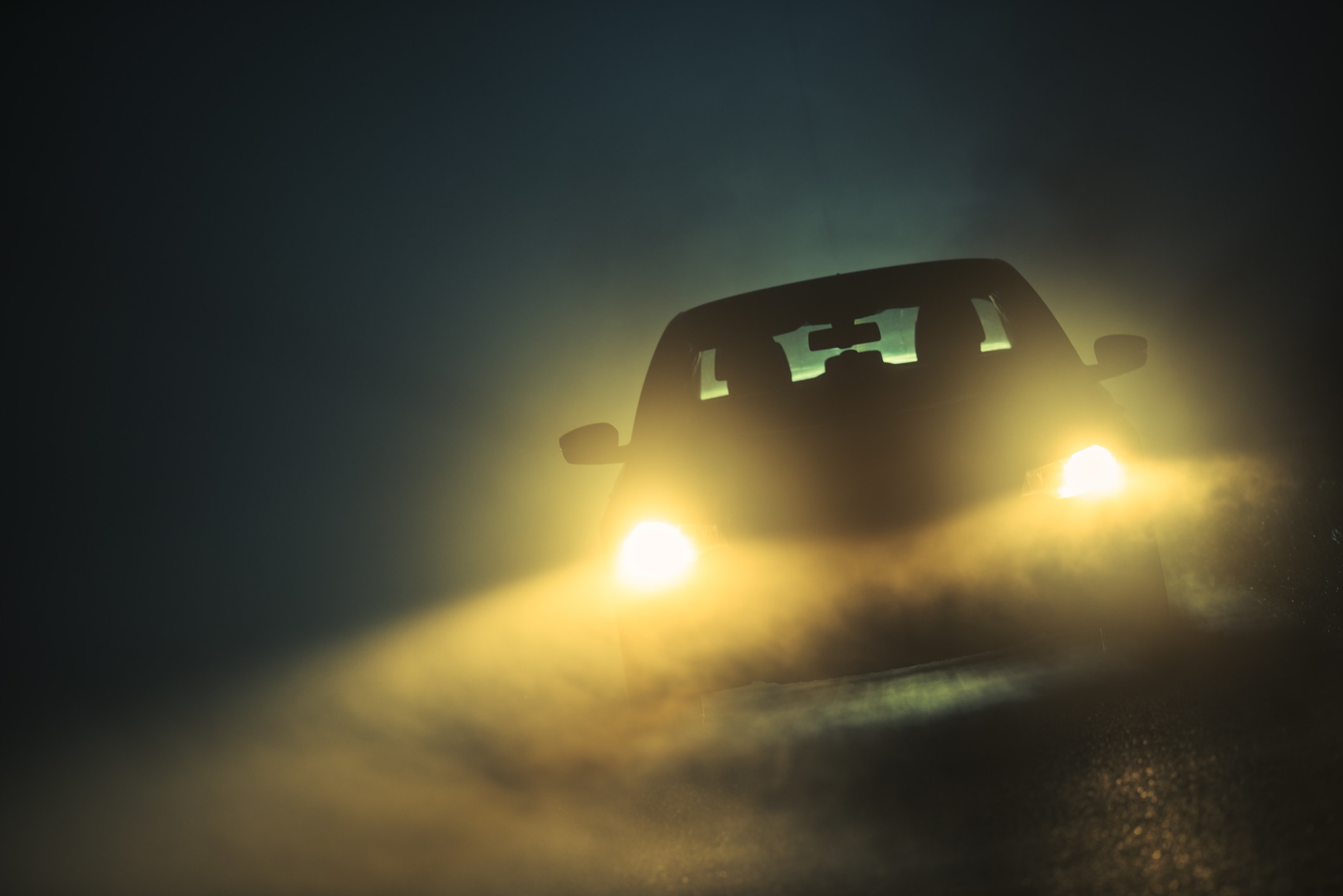 A car driving through fog