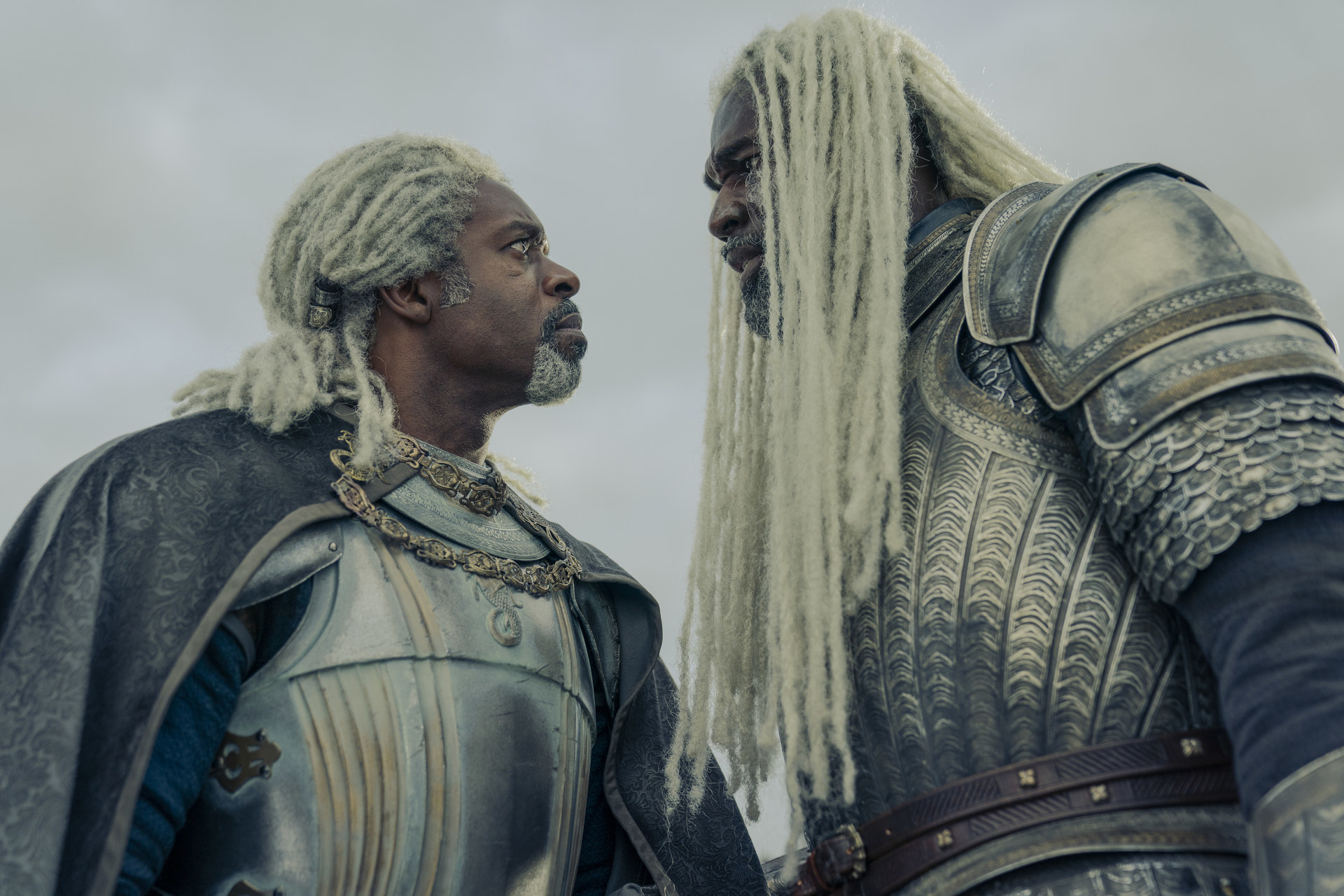 Vaemond  and Corlys talk while wearing armor