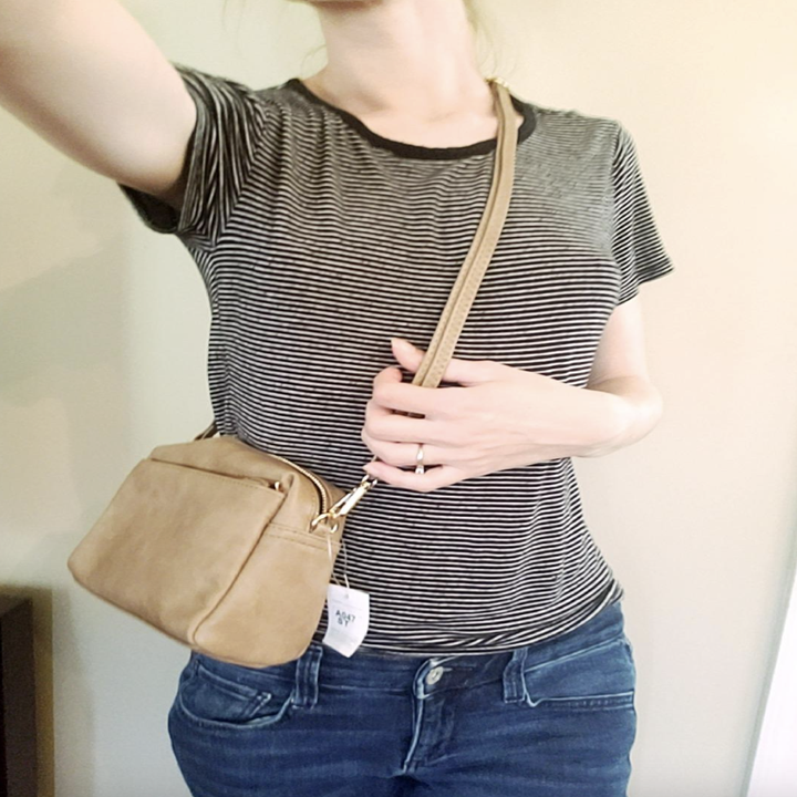 reviewer wearing crossbody purse