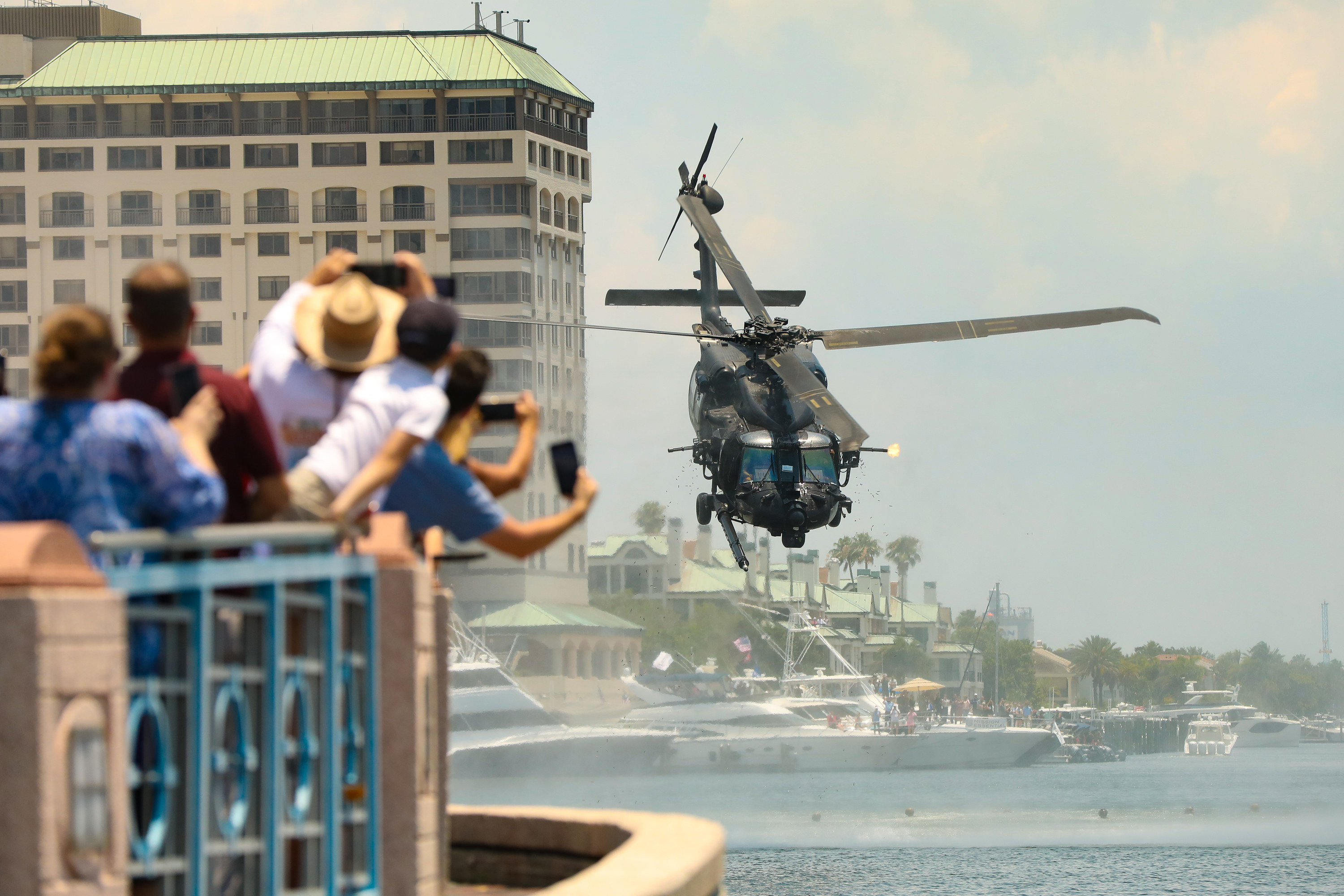 Onlookers watching a helicopter display