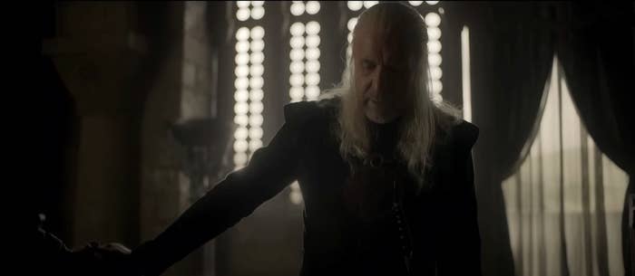 Viserys looks tired and downcast in the Small Council chamber