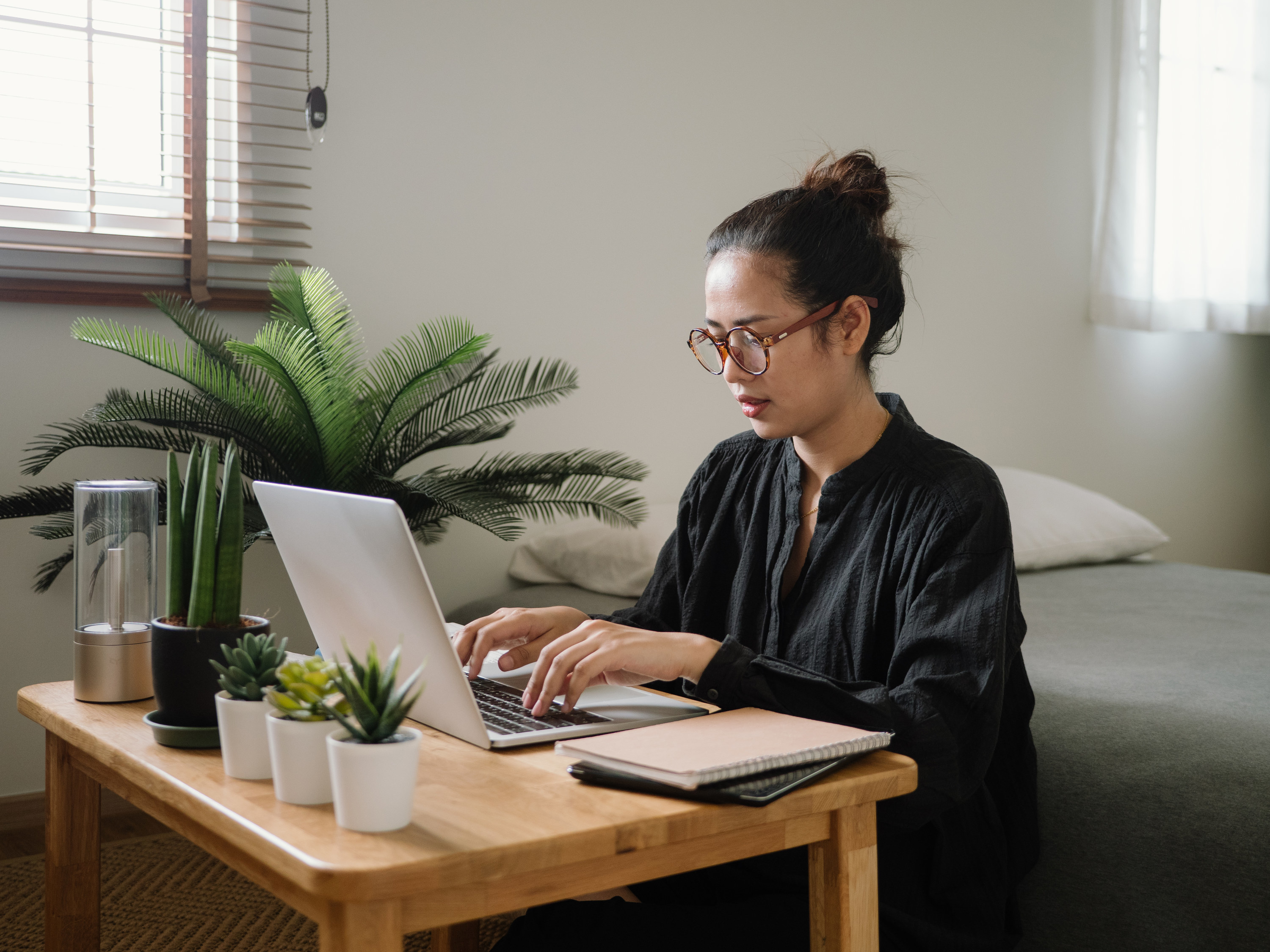 a woman working on her computer