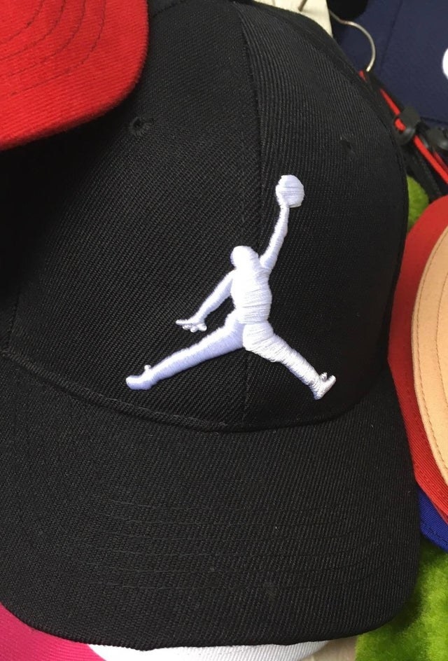 thicker than normal embroidered basketball player on a hat resembling Air Jordan logo
