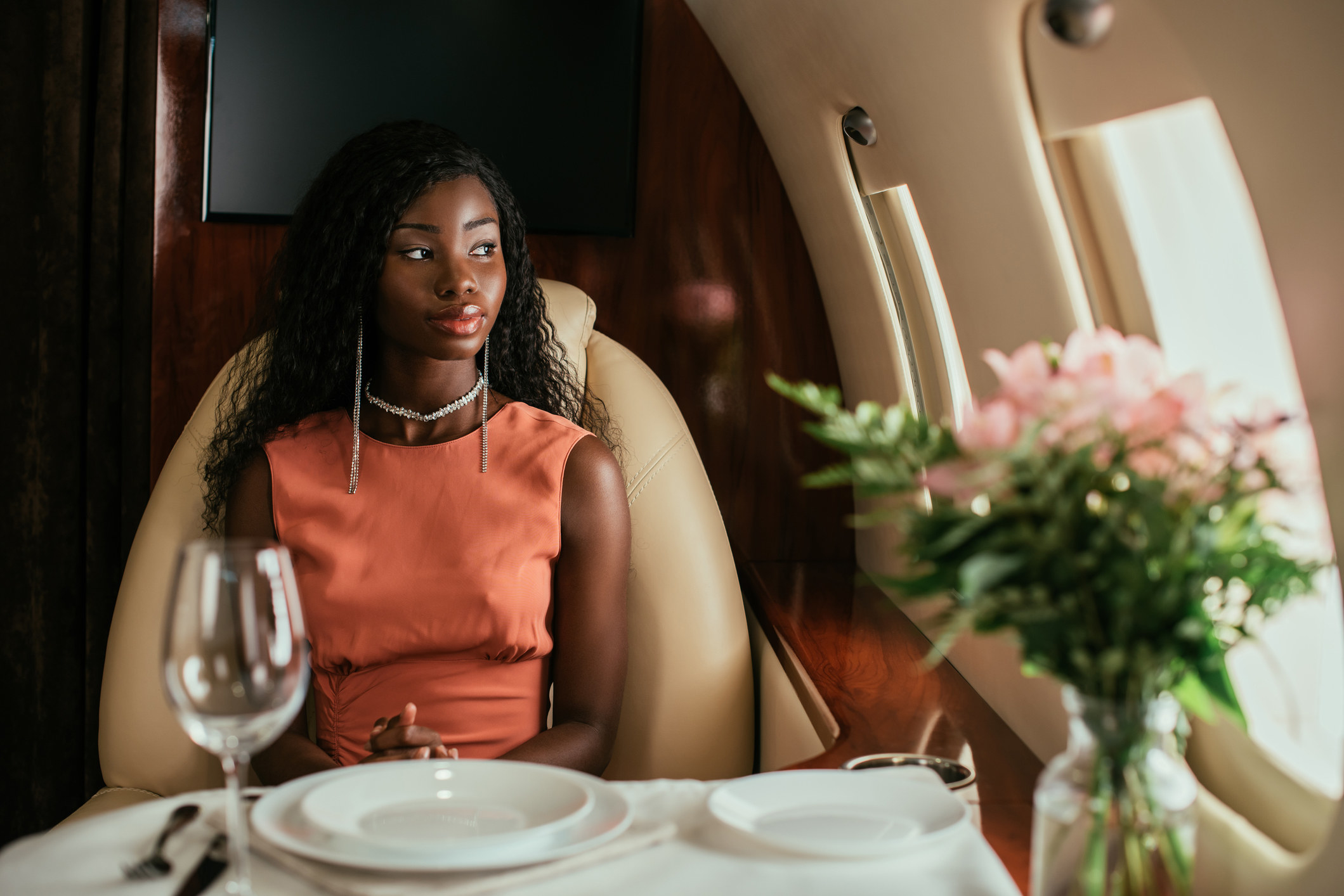 A woman on a private jet