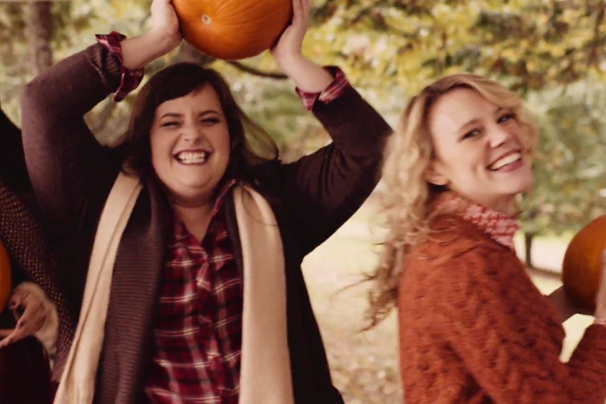 Aidy Bryant and Kate McKinnon smiling while holding pumpkins in an &quot;SNL&quot; sketch