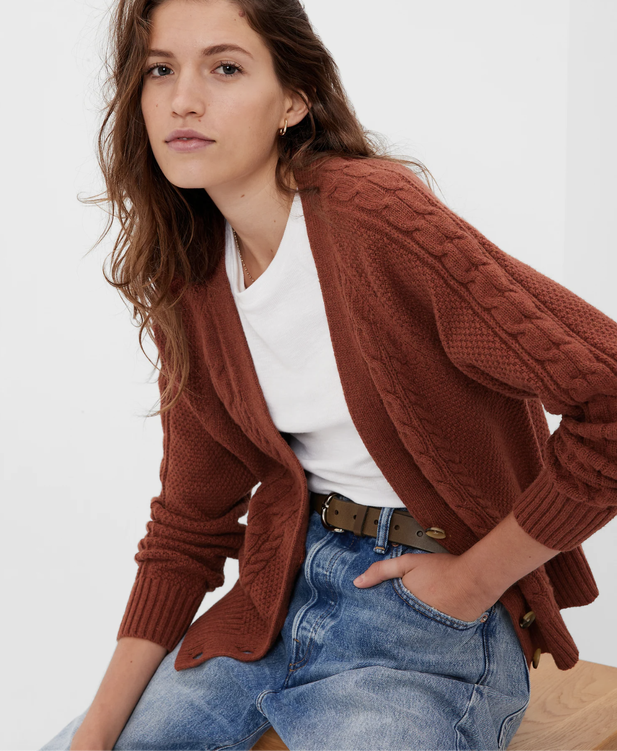 A person wearing the cardigan with jeans and a tee