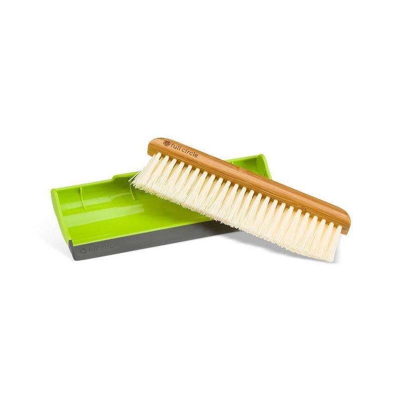 Wooden counter sweep brush with green crumb catching tray