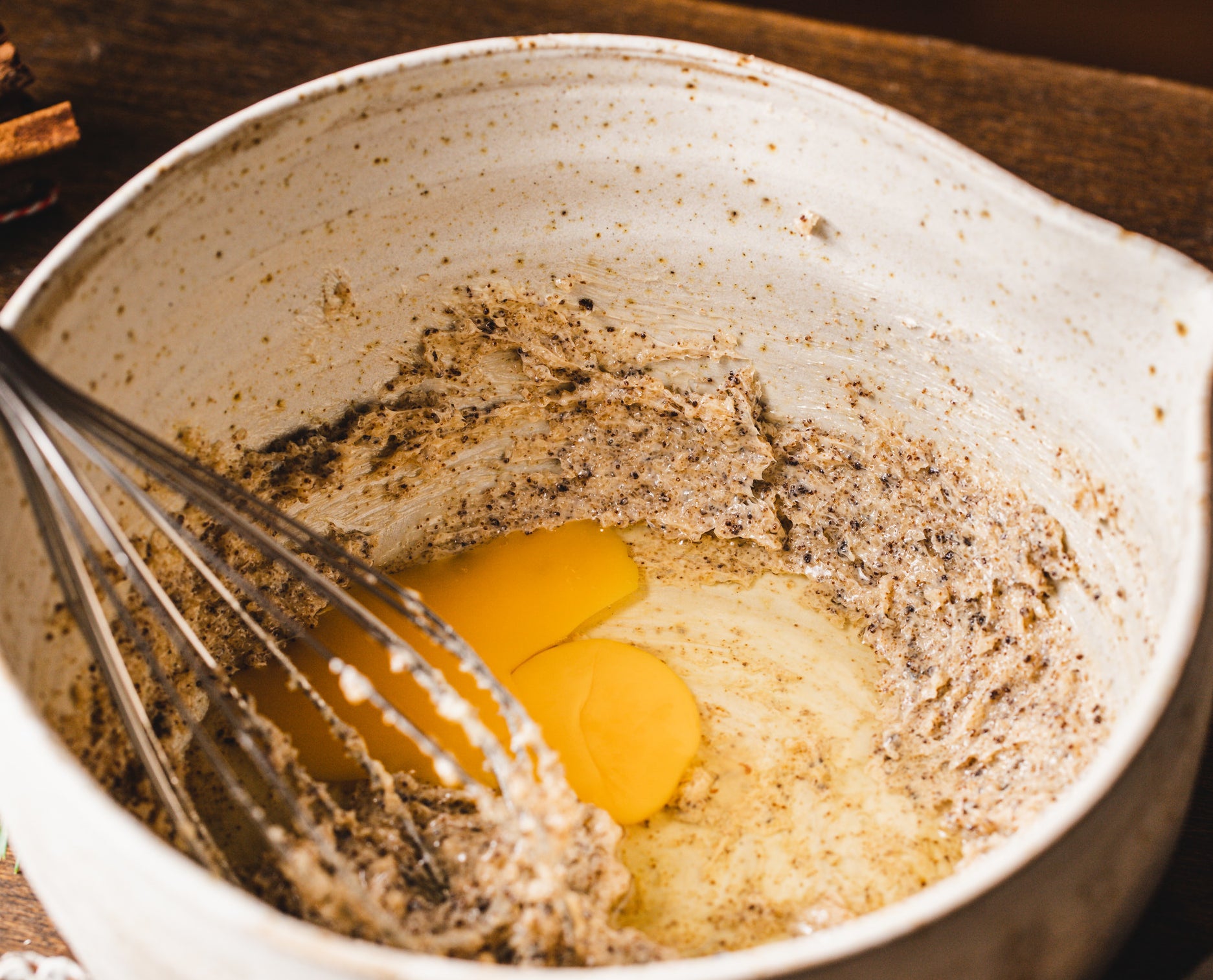 whisking egg yolks into cookie dough
