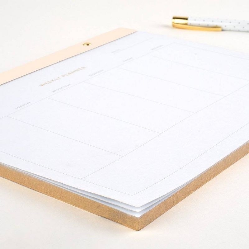 the desktop planner and a pen