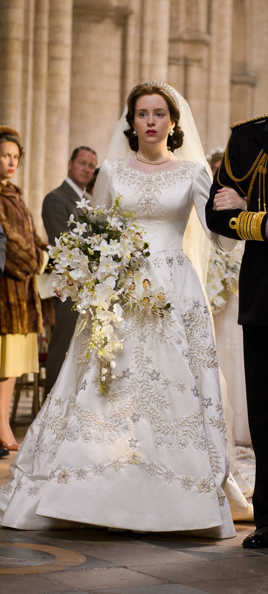 the actor playing Queen Elizabeth II wearing a similar dress