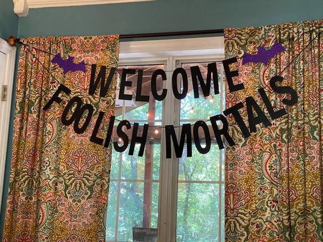 A motion hangs up that says WELCOME FOOLISH MORTALS successful a reviewer's window