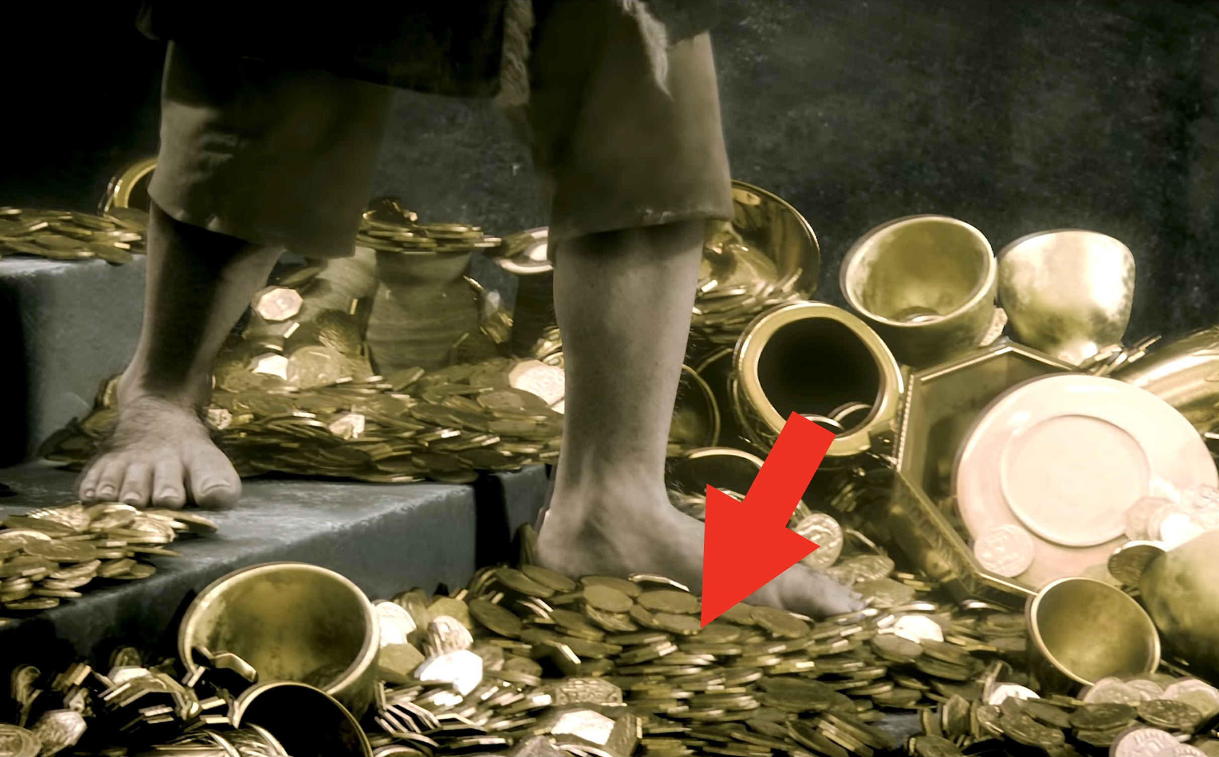 hobbit feet on gold coins
