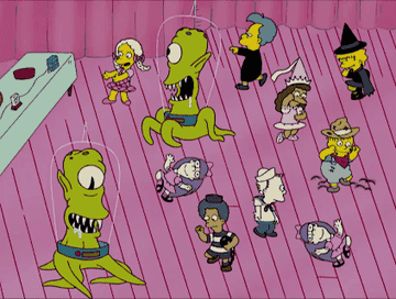 Kang and Kodos dance with schoolchildren in “Treehouse of Horror XIX”