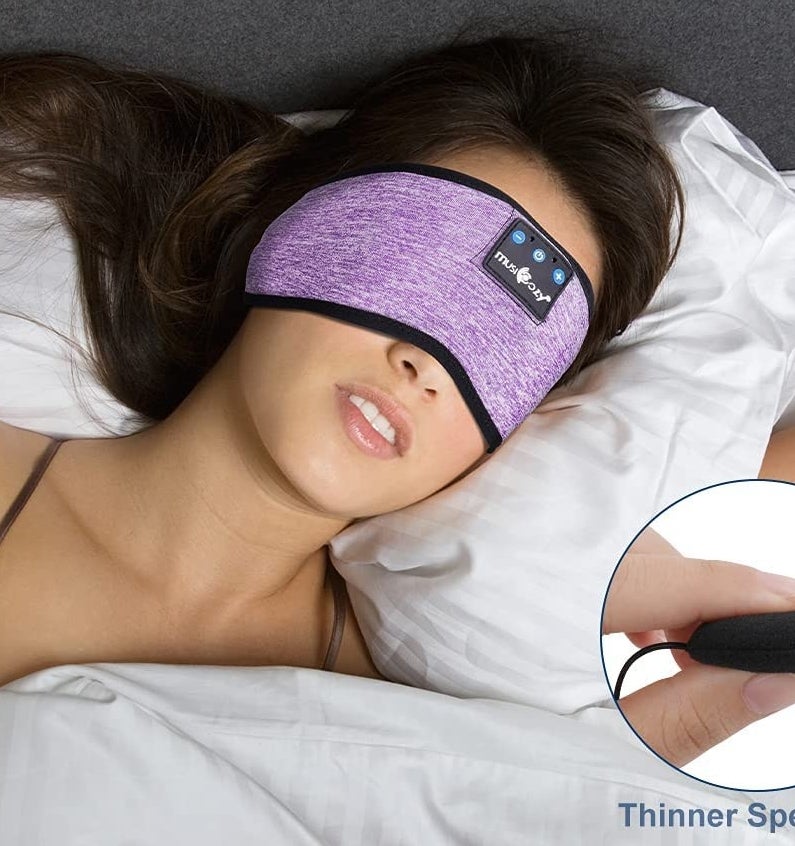 A person sleeping while wearing the mask