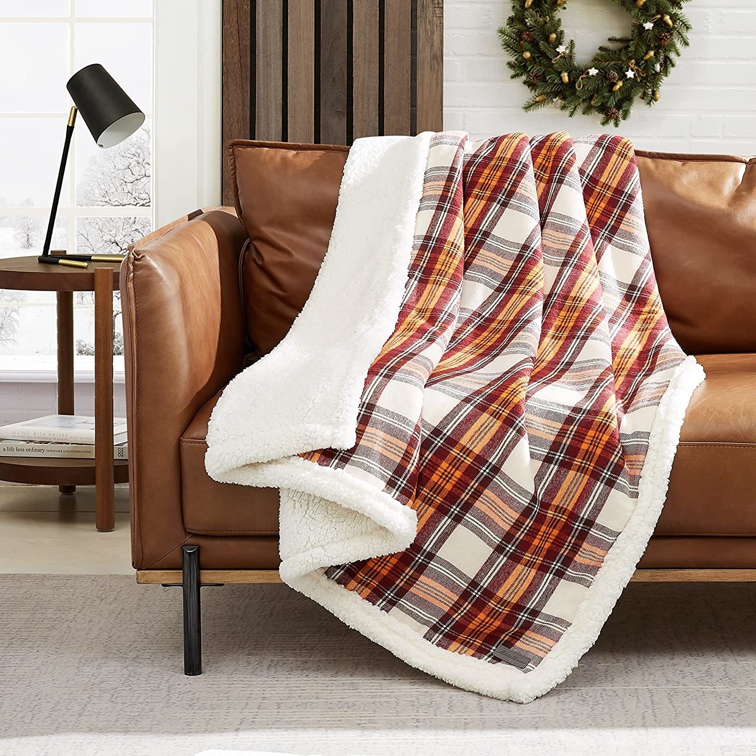 Eddie Bauer blanket placed on couch
