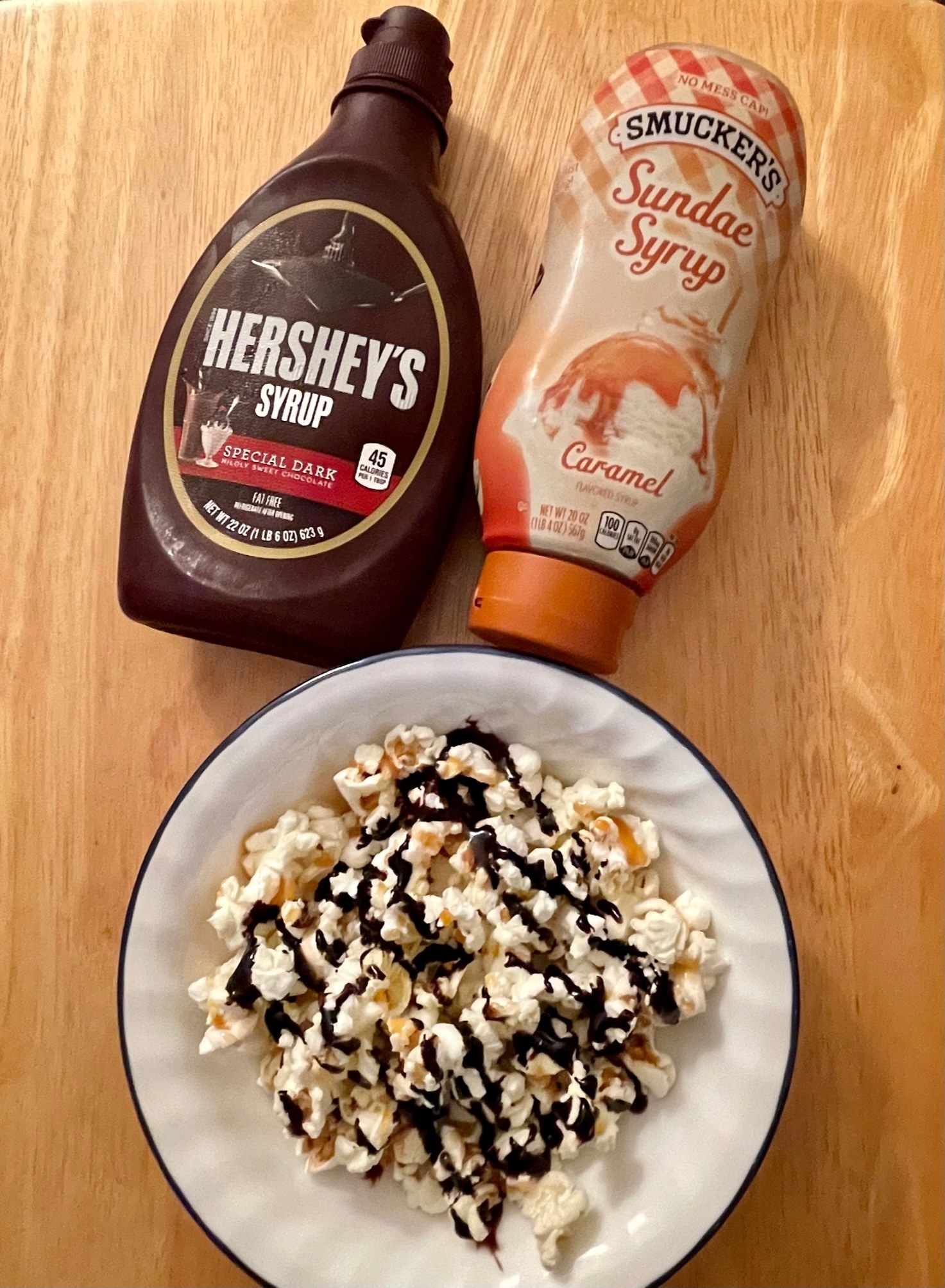 Popcorn with chocolate and caramel syrup