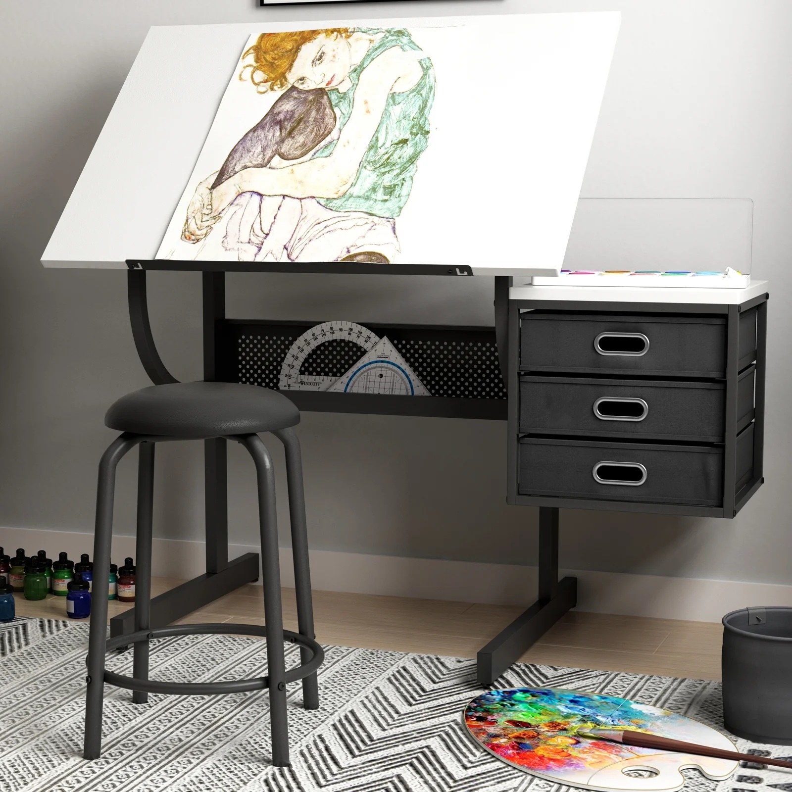 a black craft table with a drawing on the table