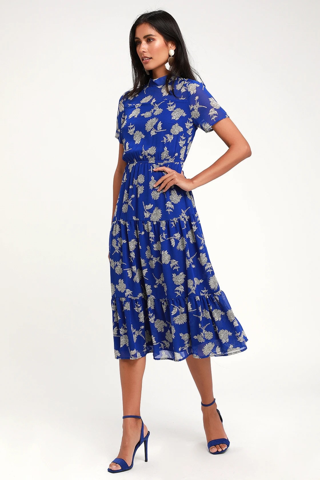 Model wearing blue floral dress