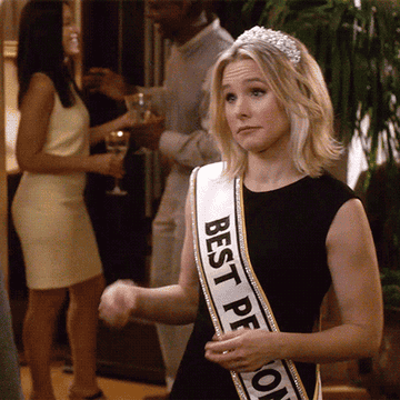 Kristen Bell wearing a Best Person ribbon