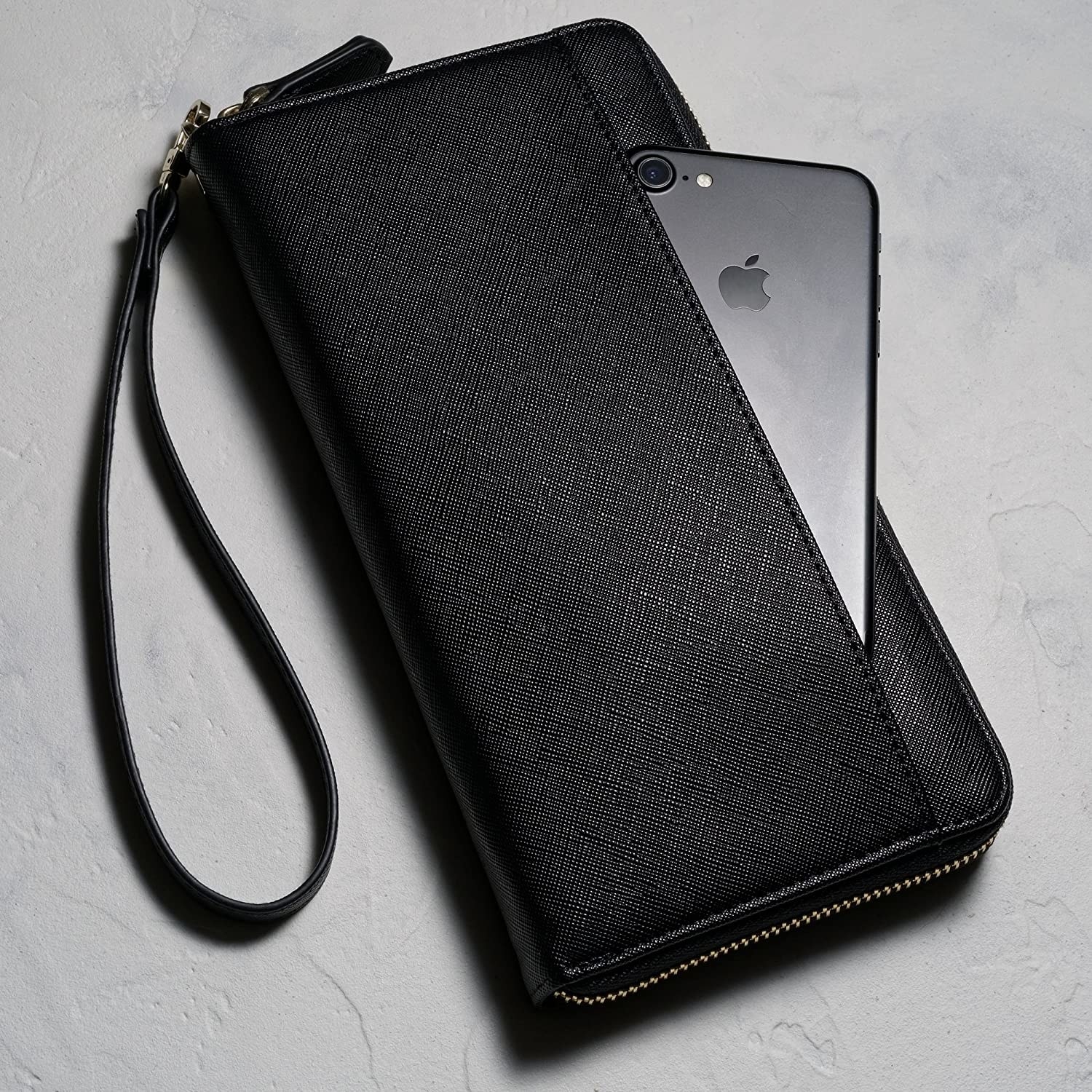 a large wallet with a phone inside