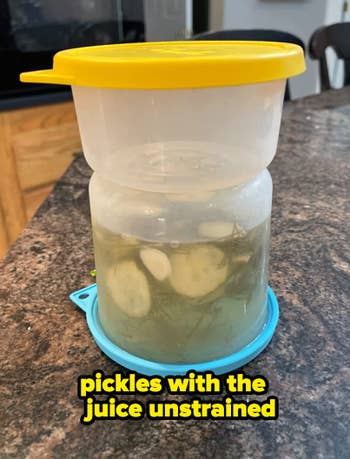 pickles and juice in a reviewer's container 