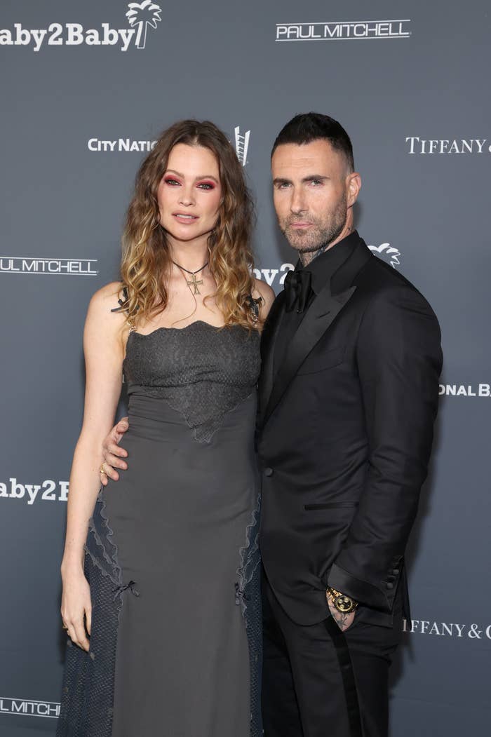 Adam on the red carpet with his wife, Behati
