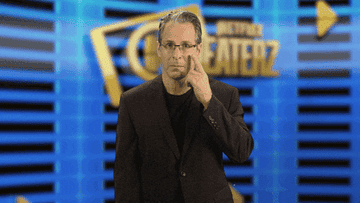 joey greco faking a tear in front of cheaterz background