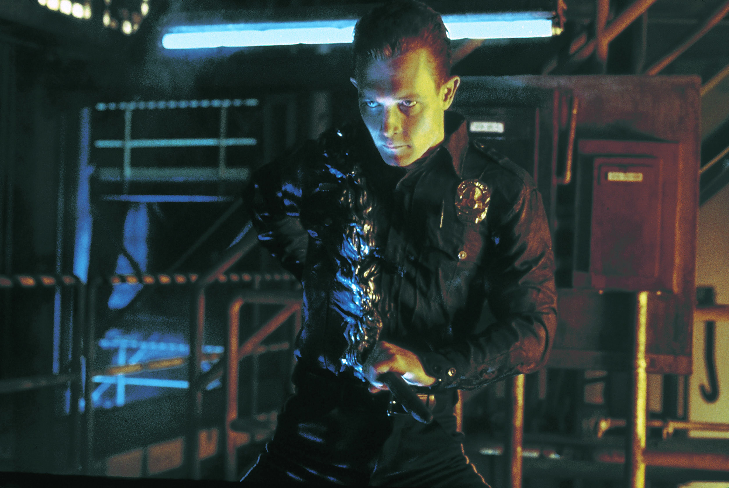 A Terminator holds a gun