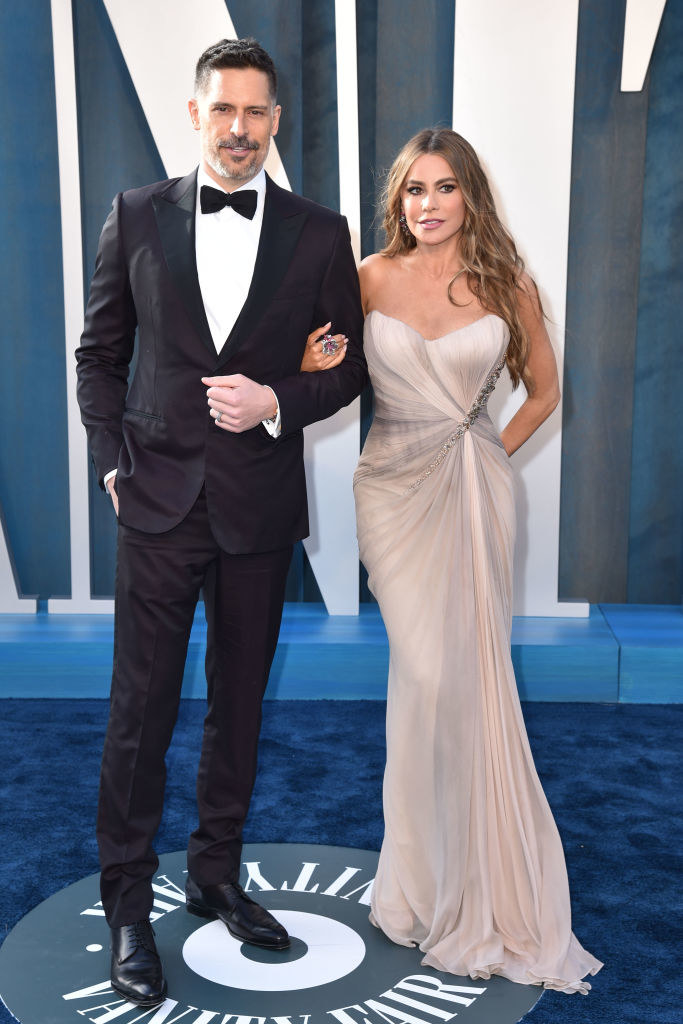 the couple dressed in formal clothing at a Vanity Fair event