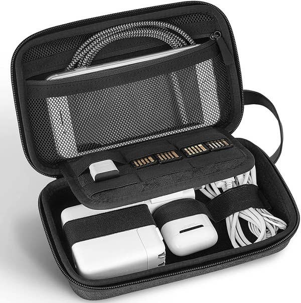 the electronics case with various devices and cords inside