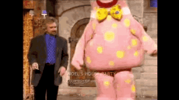 mr blobby from noels house party jumping on something