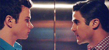 kurt and blaine from glee looking at each other in elevator