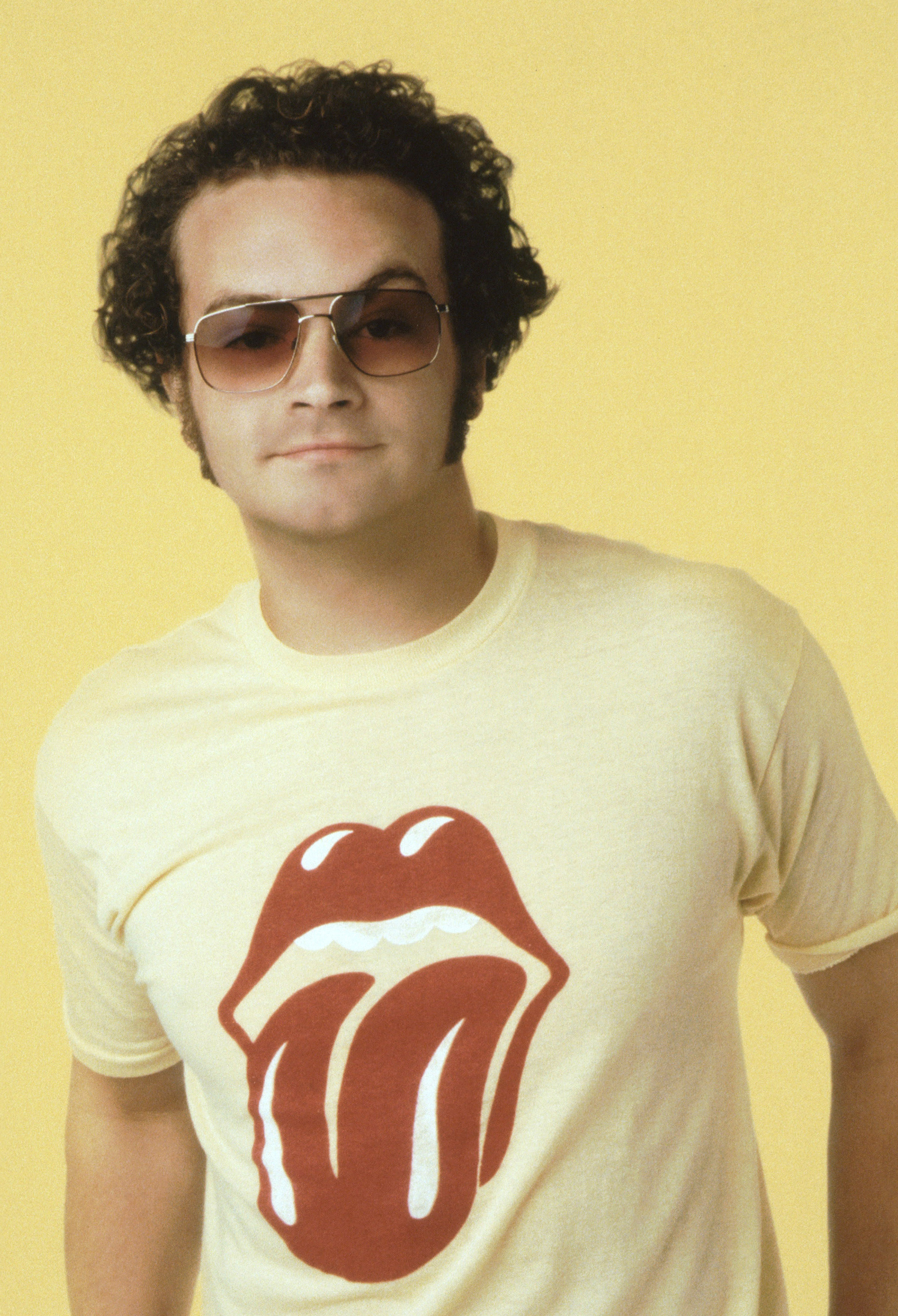 Danny in a Rolling Stones lips-and-tongue-logo T-shirt