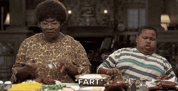 A scene around the dinner table from The Nutty Professor with the caption &quot;fart&quot;