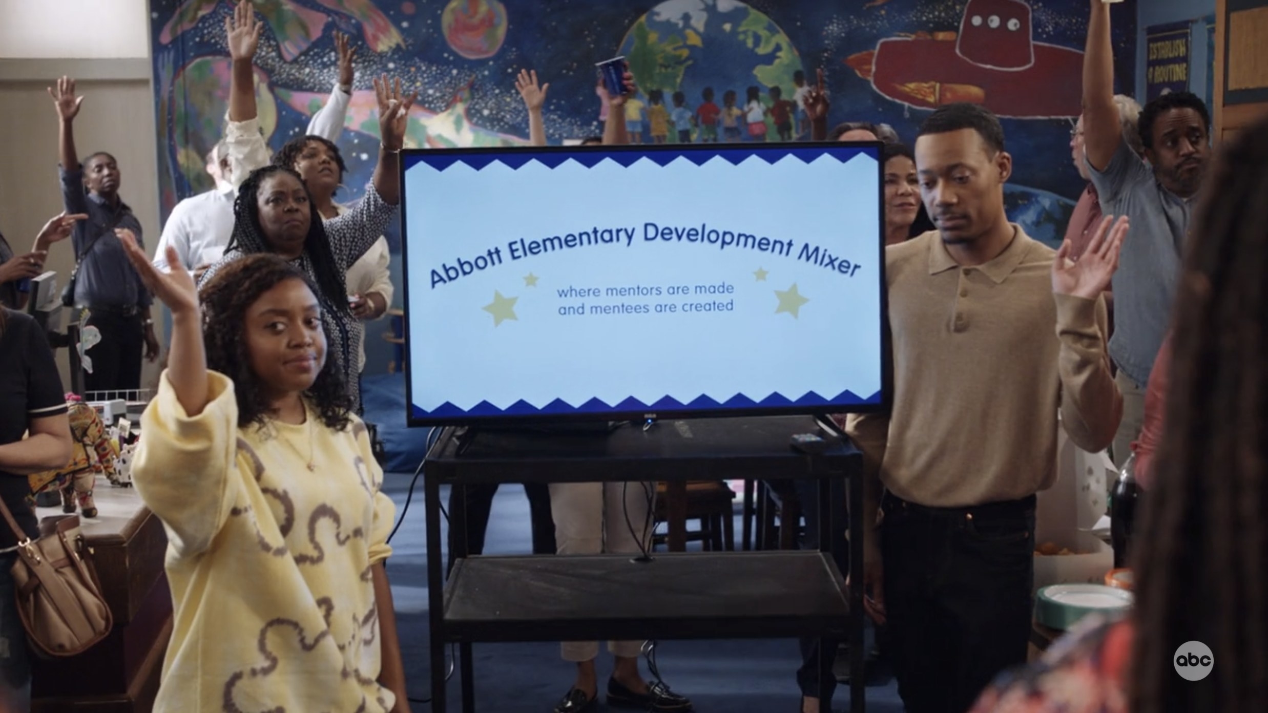 the teachers on abbott elementary raising their hands