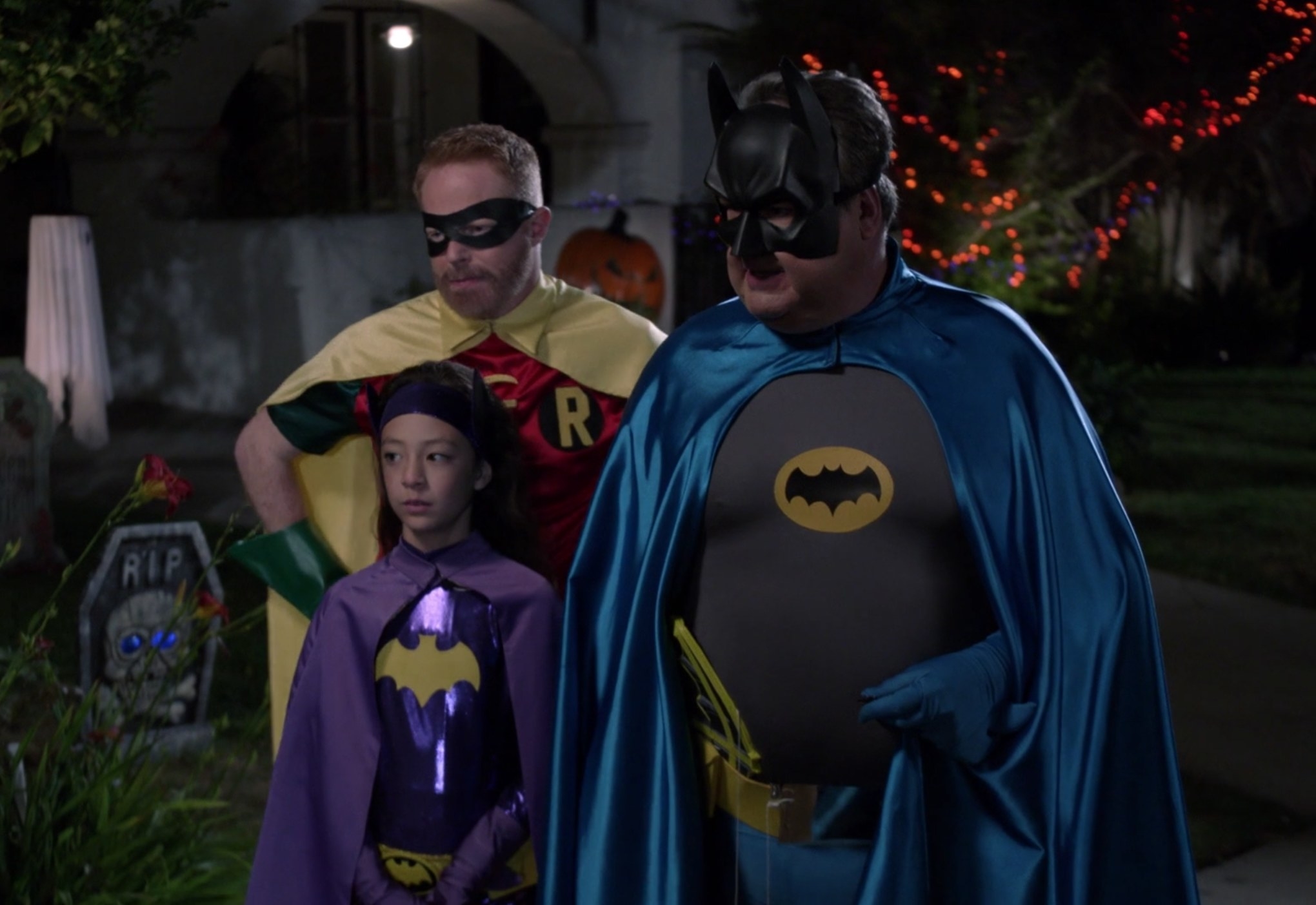 Cam, Mitch and Lily dressed as batman, robin and batgirl