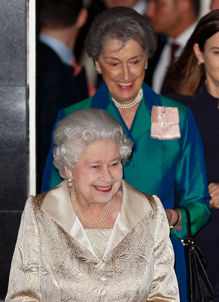 The Queen smiling with Lady Susan Hussey behind her