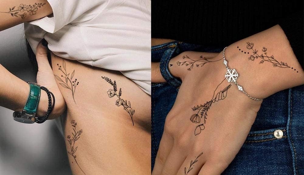 Two people with different floral temporary tattoos on their bods
