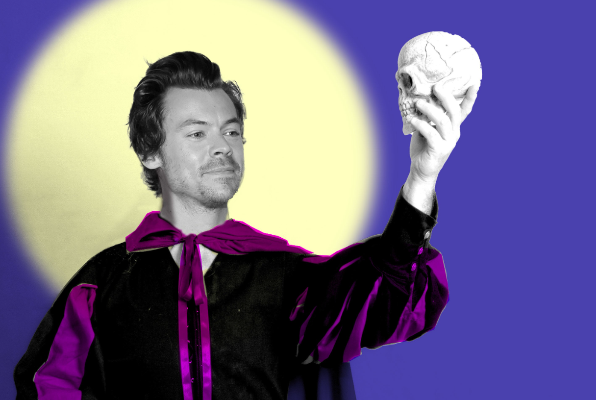 harry styles in a purple cape holding a skull