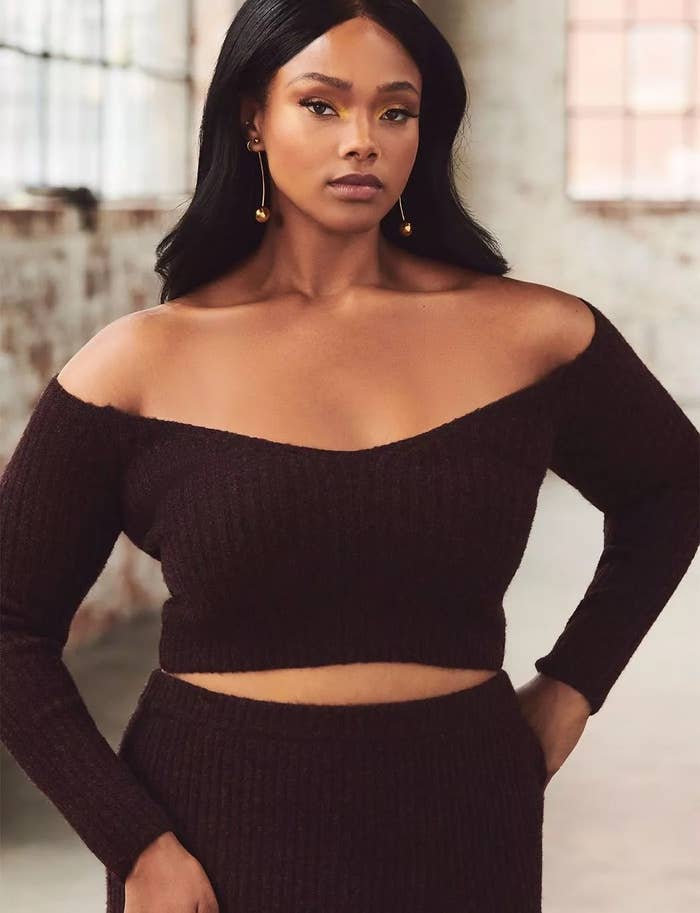 Model wearing brown matching skirt and top set