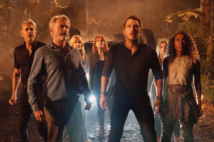 A scene from Jurassic World: Dominion with everyone looking up in fear