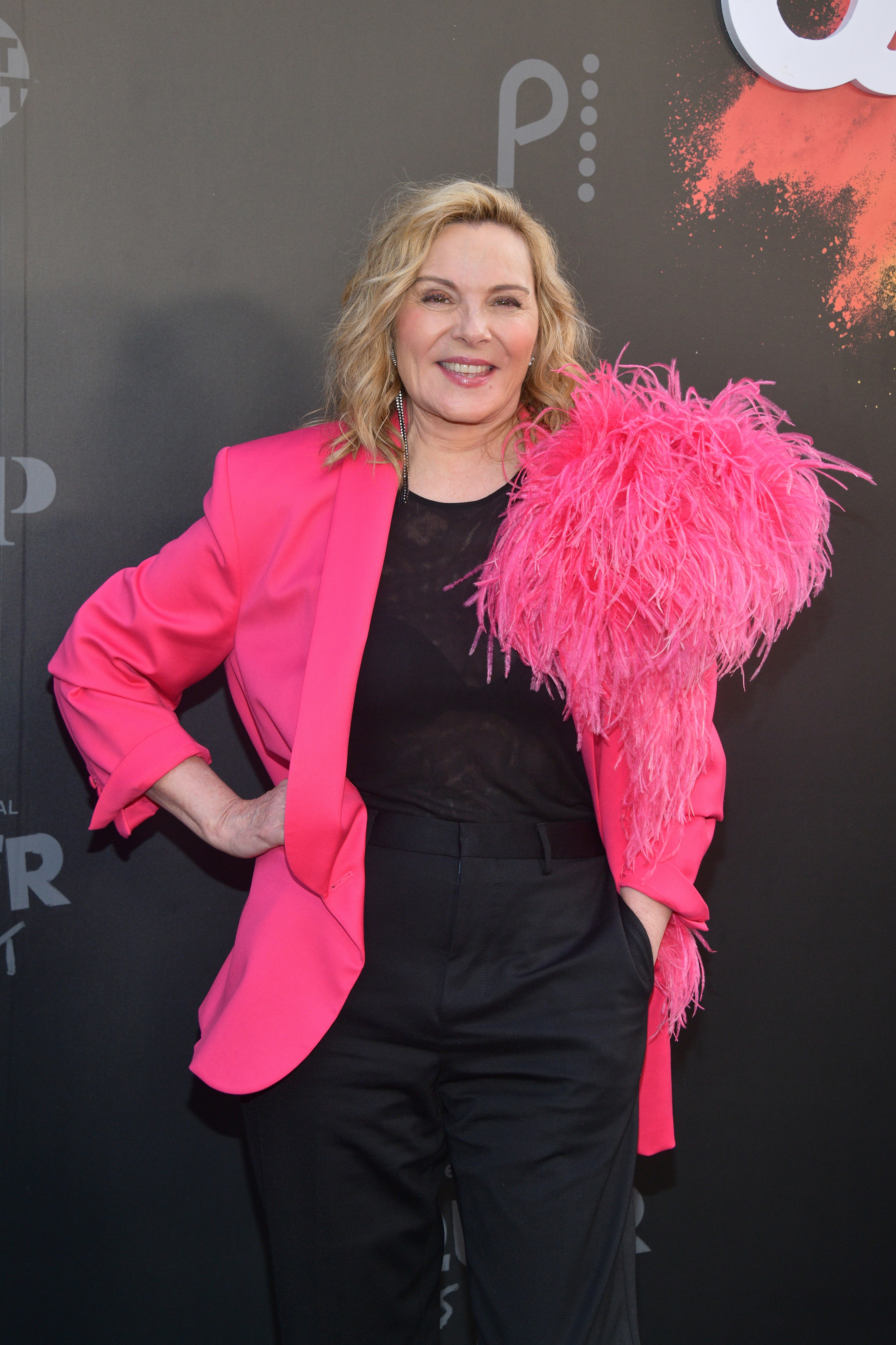 Kim Cattrall smiling at an event