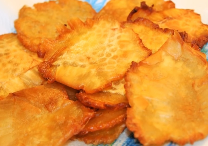 A plate of bread fruit tostones