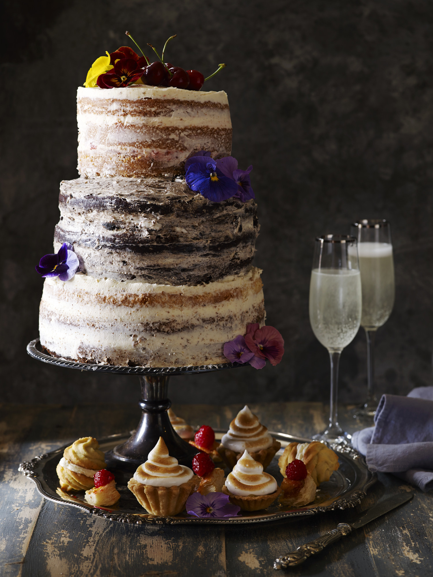 A wedding cake with no frosting