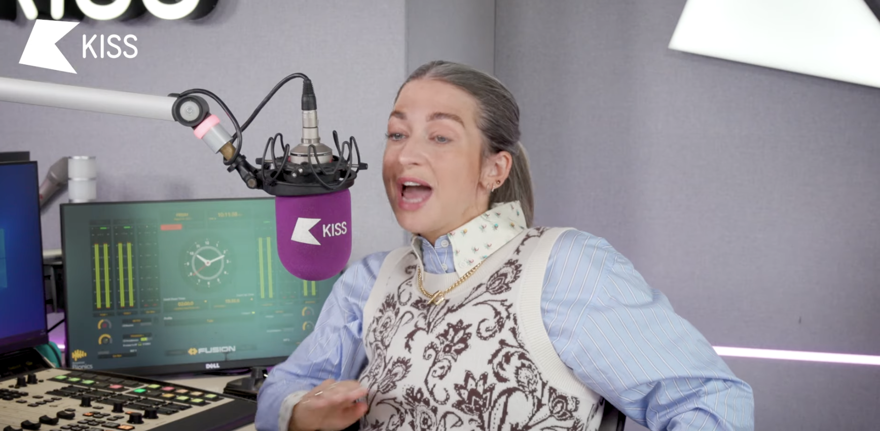 woman speaking on a radio mic