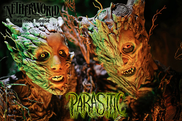 Two monstrous parasite creatures stare menacingly at &quot;Netherworld Haunted House&quot;