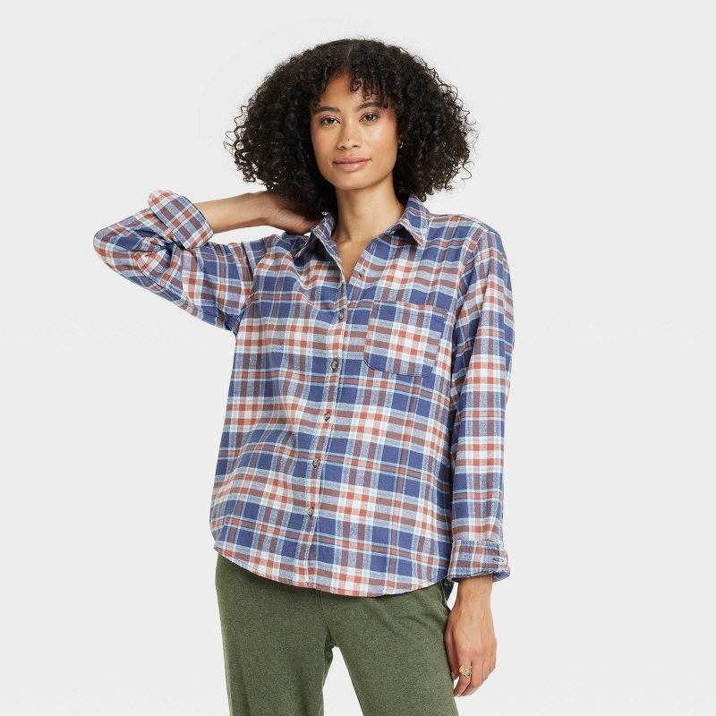 model wearing flannel shirt