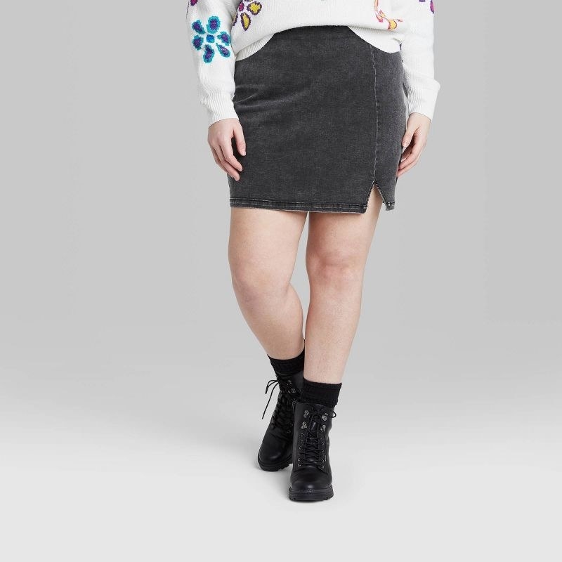 model wearing mini skirt